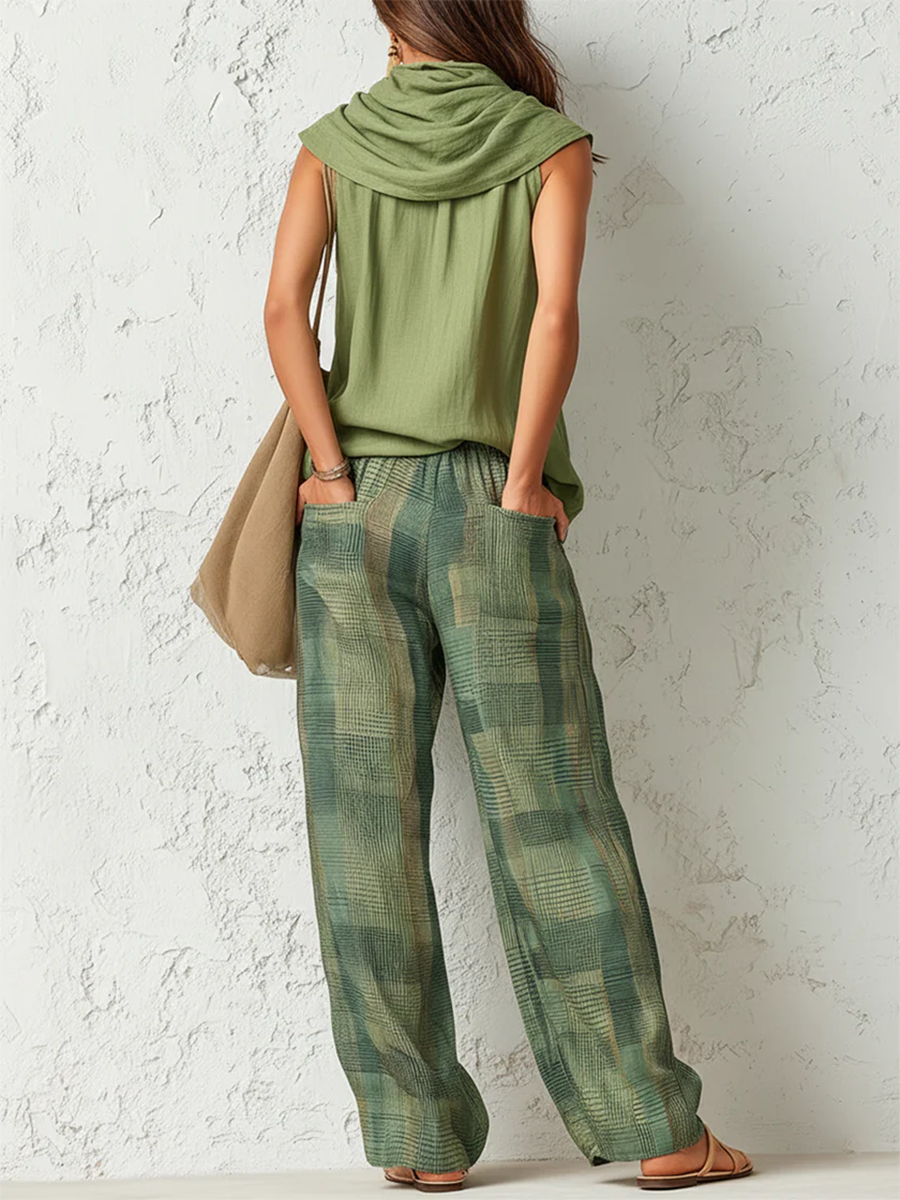 Relaxed two-piece set in sage green: cowl-neck top and plaid wide-leg pants (back)