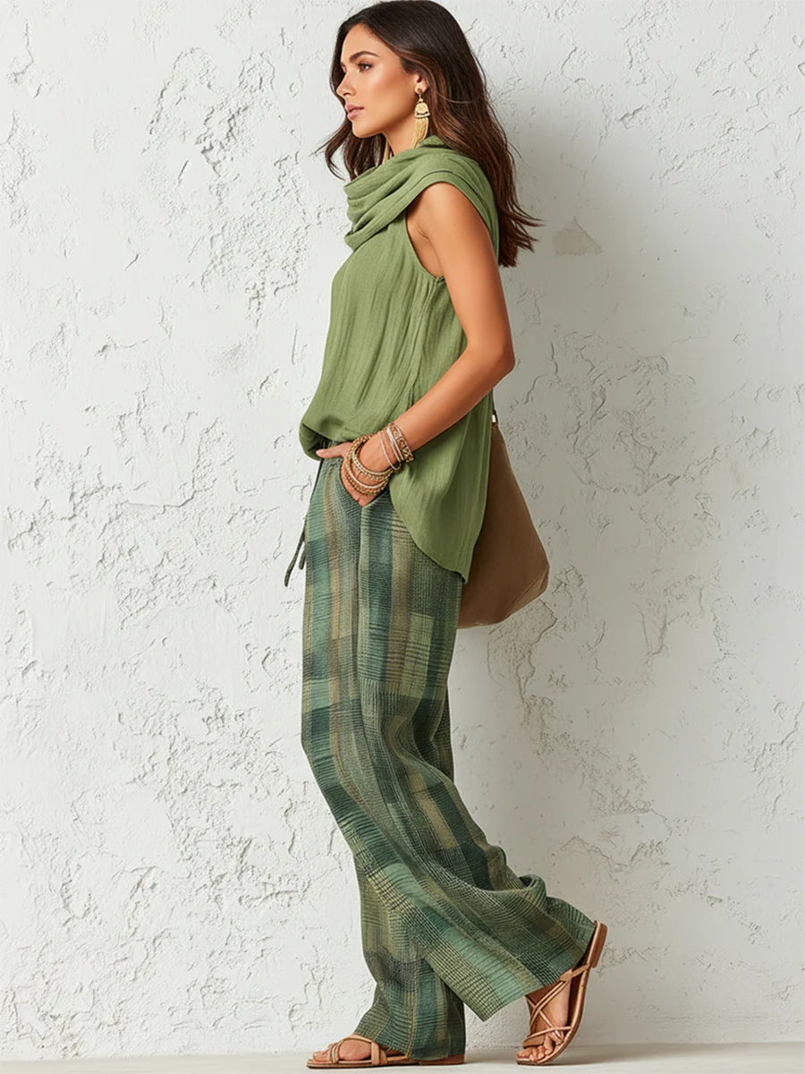 Relaxed two-piece set in sage green: cowl-neck sleeveless top and plaid wide-leg pants