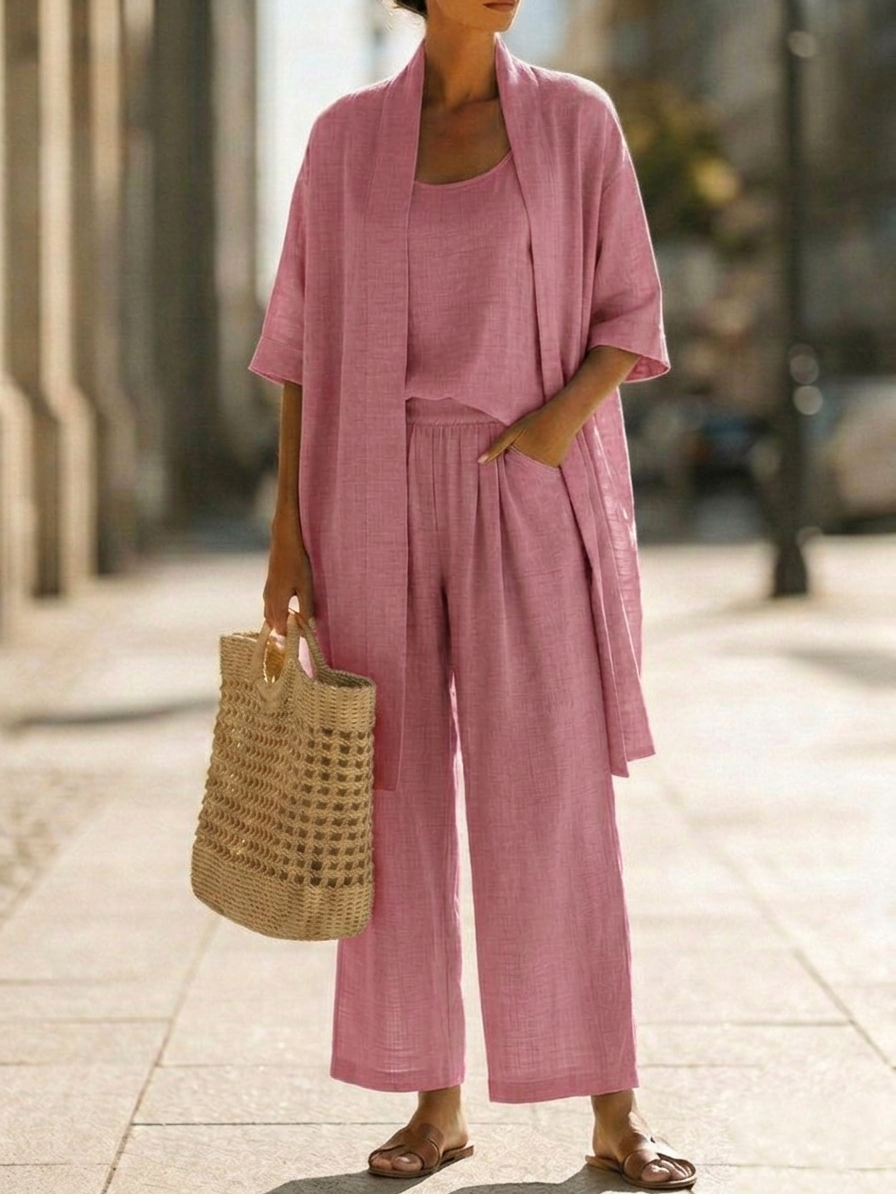Women's pink linen-style set with scoop-neck top, wide-leg pants, and short kimono cardigan
