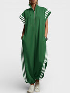 Green zip-neck jumpsuit with drawcord hood and side triple stripe accents