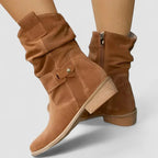 Tan-brown suede western boots with side zipper, buckle strap, stacked block heel