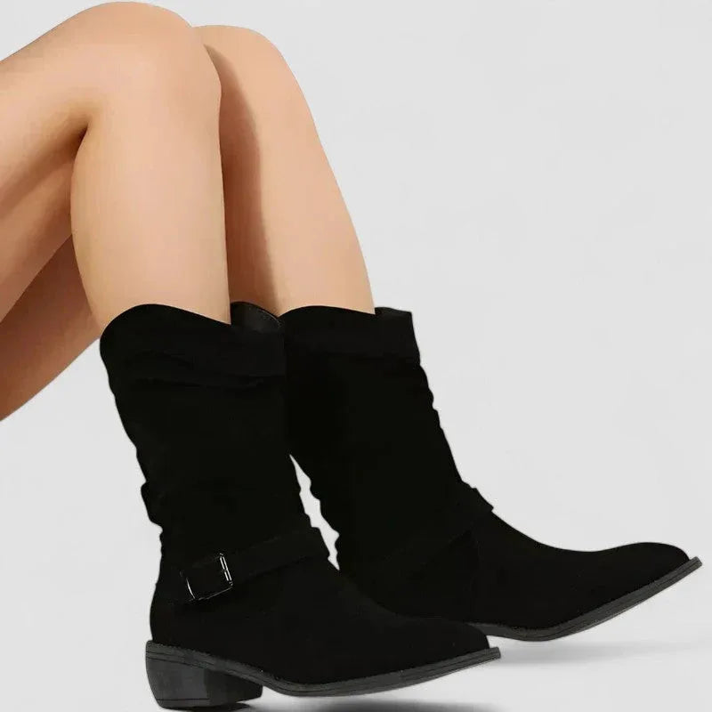 Black suede western boots with buckle strap, mid block heel and pointed toe