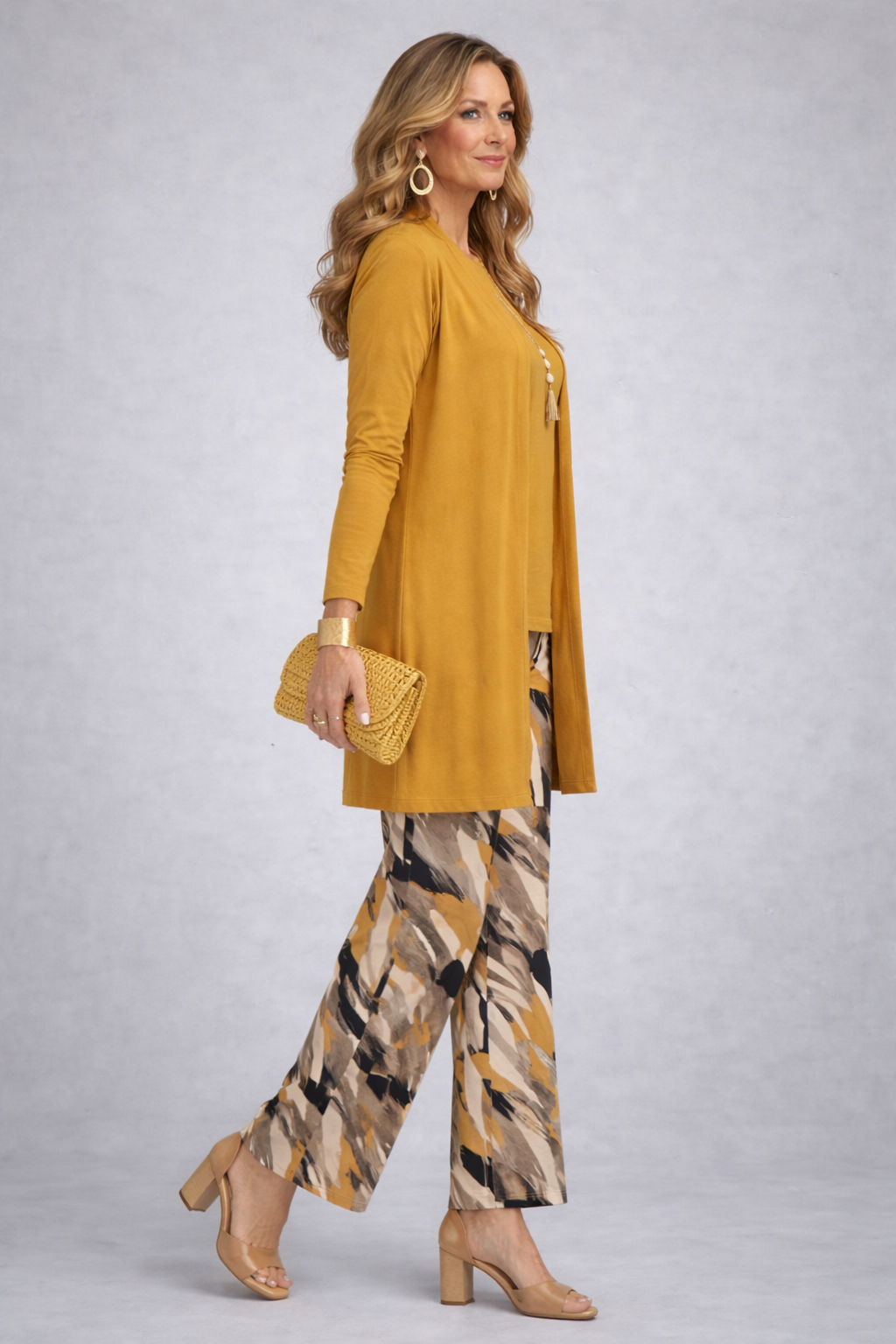 Mustard button-front tunic with patterned wide-leg pants, side view