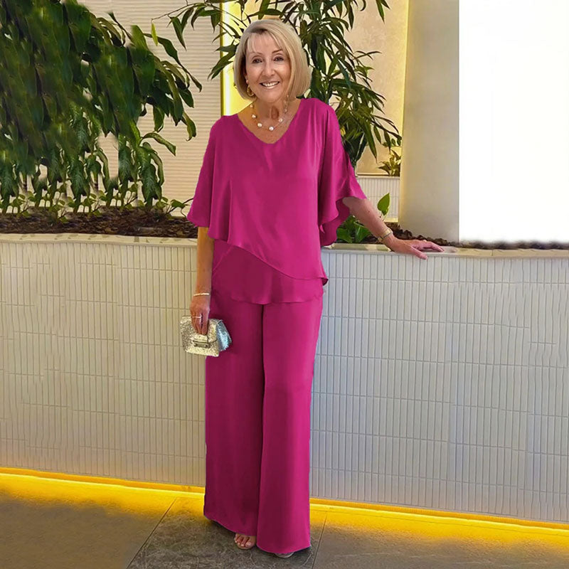 Dark pink two-piece set with flutter sleeves and wide-leg pants