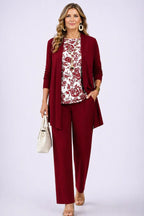 3-piece set in deep maroon with longline cardigan, floral top, and relaxed straight-leg pants.