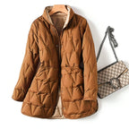 Copper-brown quilted winter puffer jacket with hood, front buttons, and side tie waist