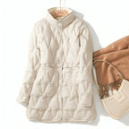 White quilted winter puffer jacket with stand collar, front button closure, and hood
