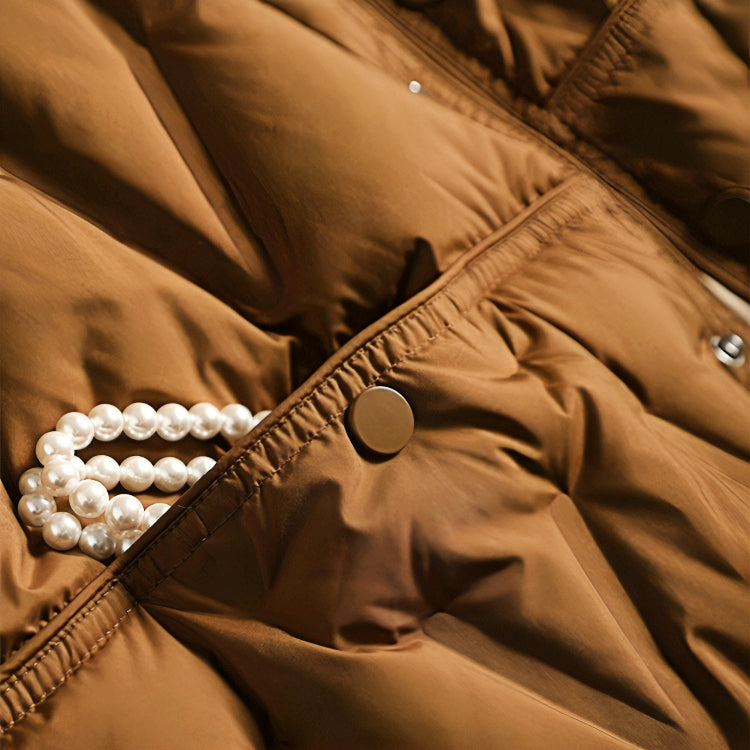 Copper-brown quilted puffer jacket detail with buttoned placket and ruched trim