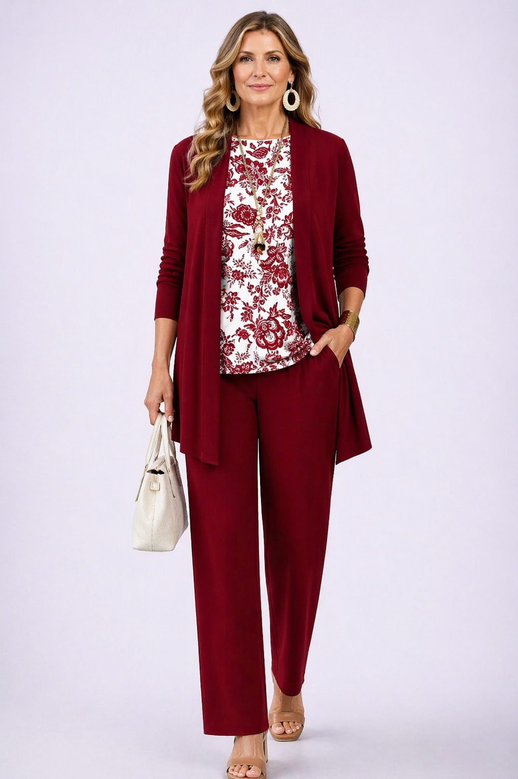 Women's 3-piece pantsuit set with burgundy cardigan, floral blouse, and matching pants