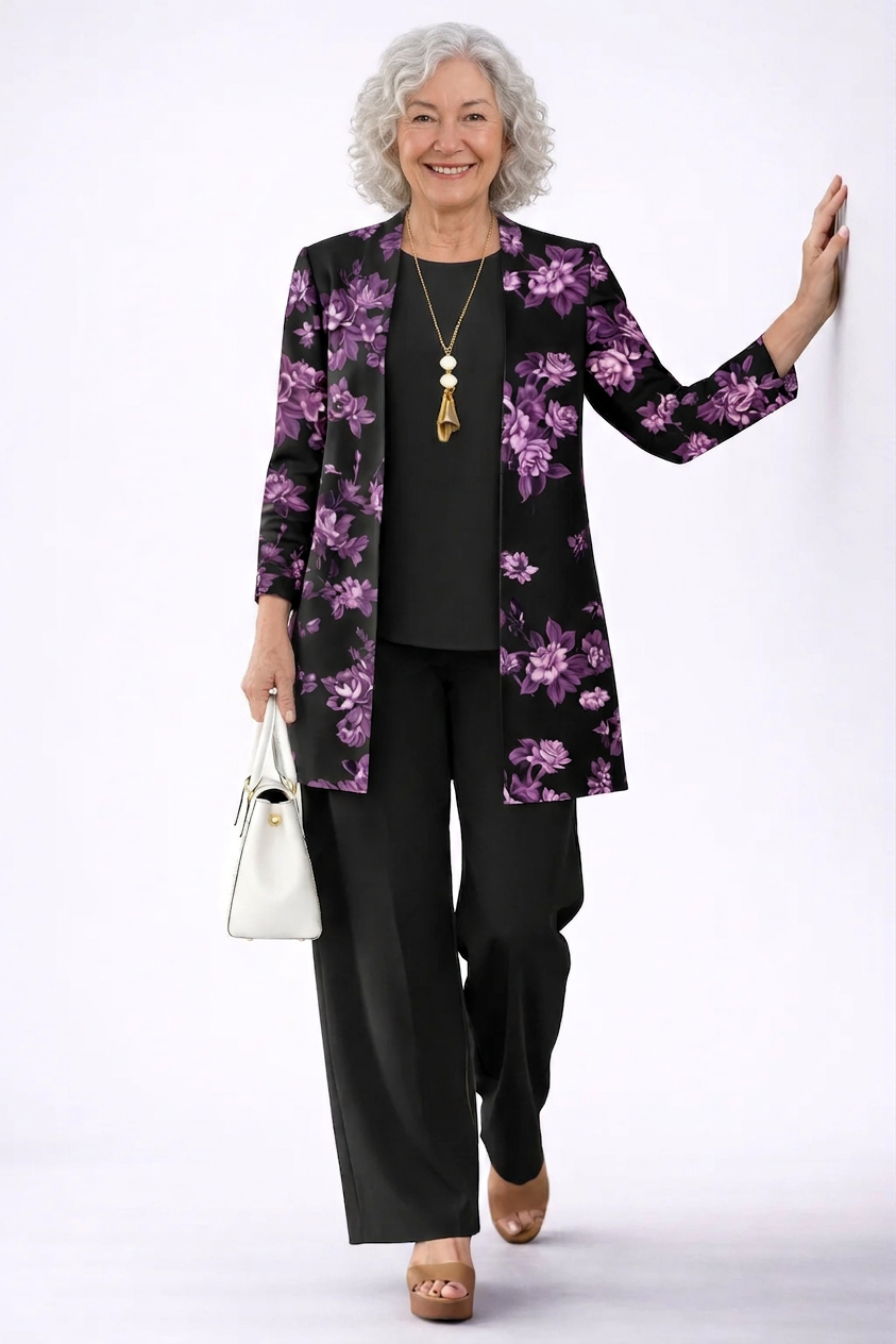 Black floral 3-piece set with long cardigan and straight-leg pants, gold necklace